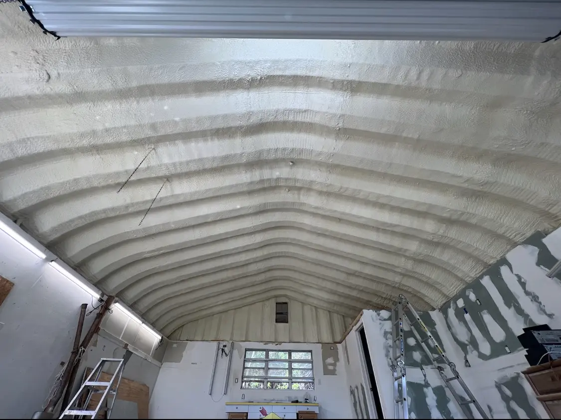 Spray polyurethane foam applied to the underside of a metal roof deck in Flowing Wells
